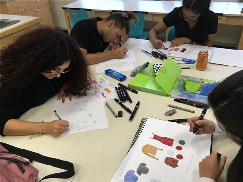 Intro to Design classes working on Flat designs 